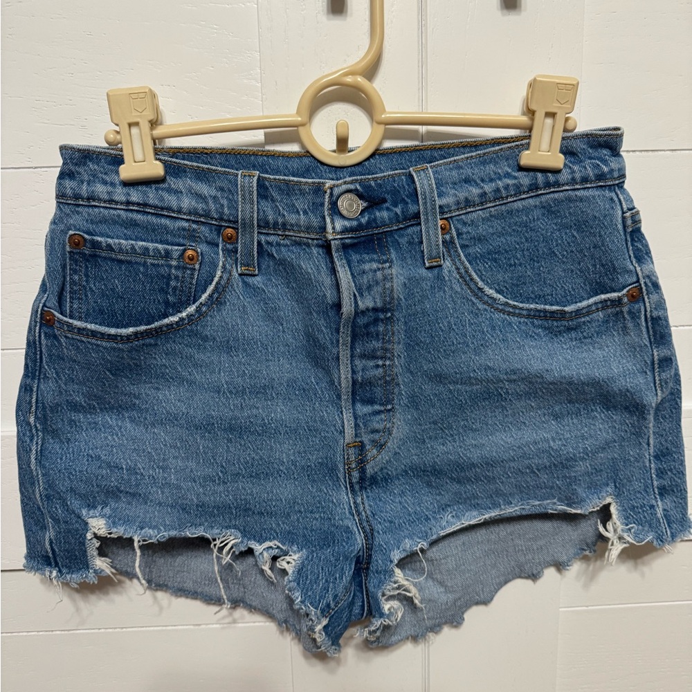 Levi’s 501 High-Waisted Blue Jean Shorts with Distressed Details